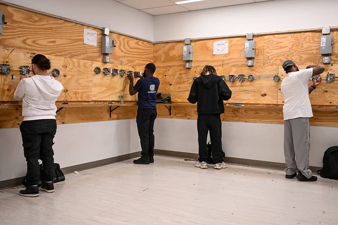 Students participating in an Advanced Electrical program's class at Apex Technical School in Manhattan, New York, USA.